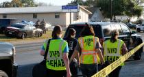 <p>Texas Department of Public Safety troopers and emergency workers outside the First Baptist Church in Sutherland Springs, Texas, Nov. 5, 2017. (Photo: R. Tomas Gonzalez/EPA-EFE/REX/Shutterstock) </p>