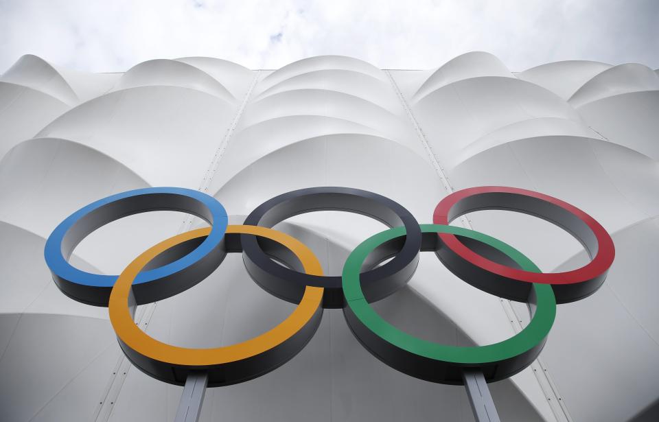 FILE - The Olympic rings are displayed outside the basketball arena in the Olympic Park before the start of the 2012 Summer Olympics in London, on July 15, 2012. Olympic organizers from Australia said Wednesday, June 28, 2023 they have safeguards in place to stop the 2032 Brisbane Games joining Paris, Tokyo and Rio de Janeiro under investigation for financial wrongdoing. (AP Photo/Jae Hong, File)