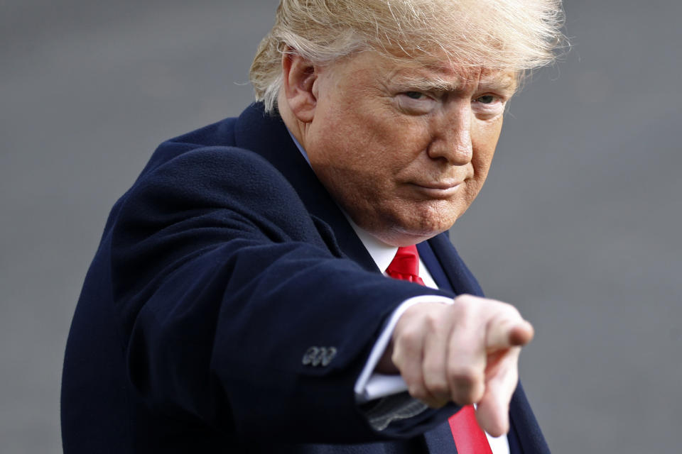 President Donald Trump gestures as he walks to the Marine One helicopter after speaking to the media, Wednesday, Nov. 20, 2019, as he leaves the White House in Washington, en route to Texas. (AP Photo/Patrick Semansky)