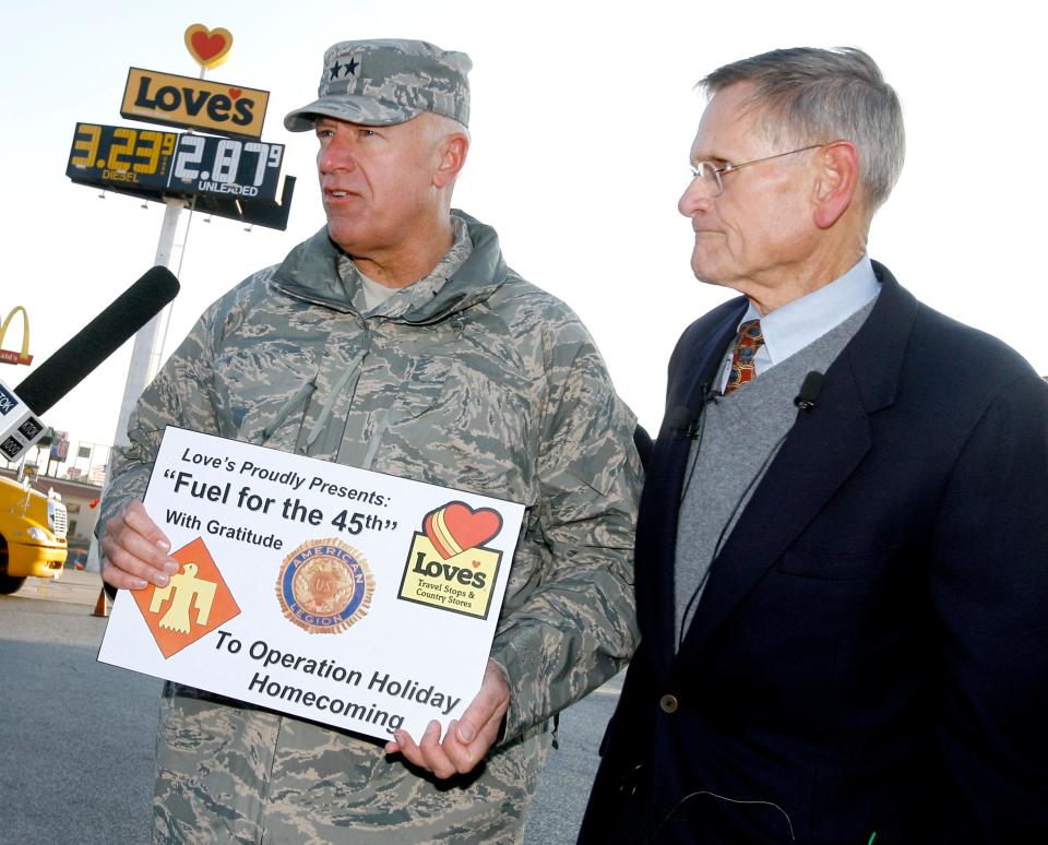 Maj. Gen. Harry Wyatt III, Oklahoma's adjutant general, at left, along with Love's CEO Tom Love, are shown at a 2007 news  conference announcing "Fuel for the 45th." Love donated fuel for Operation Holiday Homecoming to bring nearly 2,600 military men and women from the National Guard's 45th Infantry Brigade home for the holidays.