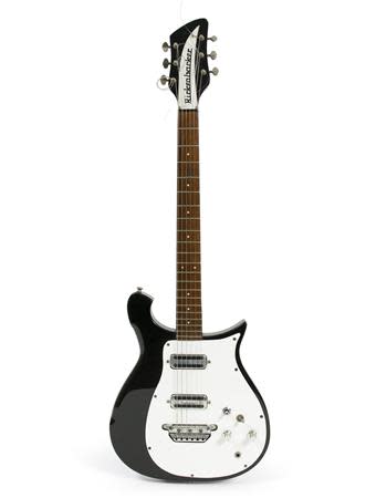 George Harrison's black-and-white 1962 Rickenbacker 425 electric guitar is shown in this handout photo provided by Julien's Auctions March 14, 2014. REUTERS/Julien's Auctions/Handout via Reuters