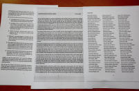 A copy of a petition with more than 100 signatures of women journalists, which was given to the government last month demanding an end to the online assaults, is seen in Islamabad, Pakistan, Friday, Sept. 18, 2020. Social media attacks against Pakistan's women journalists have been vile and vicious, some threatening rape, others even threatening death and the culprits are most often allied to the ruling party, even prompting the Committee to Protect Journalists to issue a statement on Friday condemning the relentless attacks. (AP Photo/Anjum Naveed)