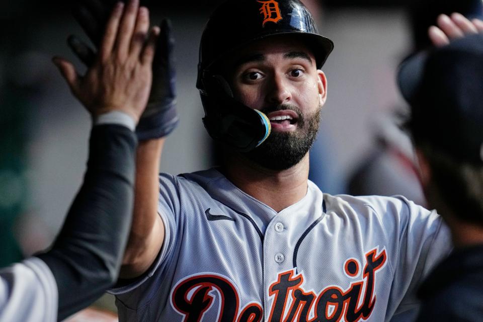 Detroit Tigers' Riley Greene celebrates in the dugout after scoring against the Cleveland Guardians during the fourth inning of Game 2 of a doubleheader at Progressive Field in Cleveland on Friday, Aug. 18, 2023.