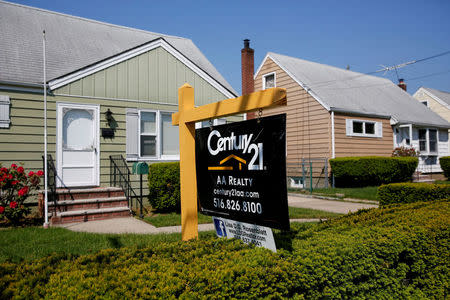 FILE PHOTO: A 'House For Sale' sign is seen outside a single family house in Uniondale, New York, U.S., May 23, 2016. REUTERS/Shannon Stapleton/File Photo