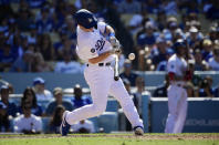 Los Angeles Dodgers' Will Smith hits a two-run walkoff home run during the ninth inning of a baseball game against the Colorado Rockies Sunday, June 23, 2019, in Los Angeles. (AP Photo/Mark J. Terrill)