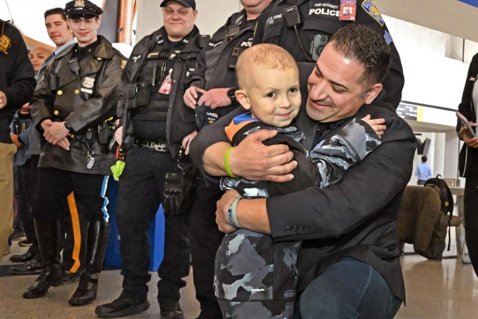 8 year old pediatric brain cancer patient Julian Galloway, 8, (pictured) was flown by the Blue Lives Matter non-profit to New York to spend a few days with the NYPD. Gregory P. Mango