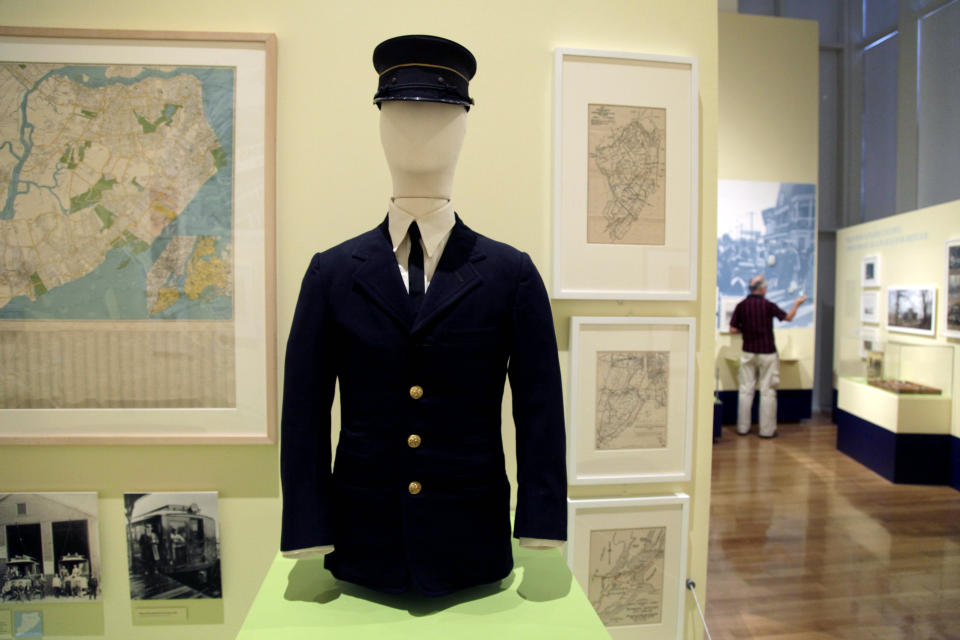 In this Thursday, Sept. 13, 2012 photo, an early 20th century uniform worn by a Staten Island Rapid Transit operator is displayed at the exhibit "From Farm to City: Staten Island 1661-2012" at the City of New York Museum in New York. It is known as New York City's greenest borough _ and also as its forgotten borough. Aside from the Staten Island Ferry, the Verrazzano Bridge and maybe the Fresh Kills landfill, few people know anything about Staten Island and its rich history and influence on the development of the rest of the city. Now, this new exhibition aims to rectify that. (AP Photo/Seth Wenig)