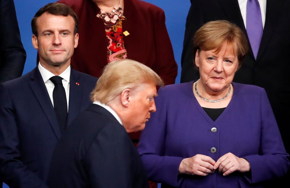 <p>Emmanuel Macron, Donald Trump and Angela Merkel at the 2019 Nato summit</p>Pool/AFP via Getty Images