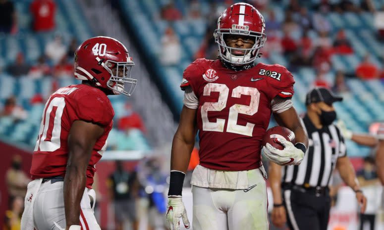 Najee Harris celebrates a touchdown against Ohio State.