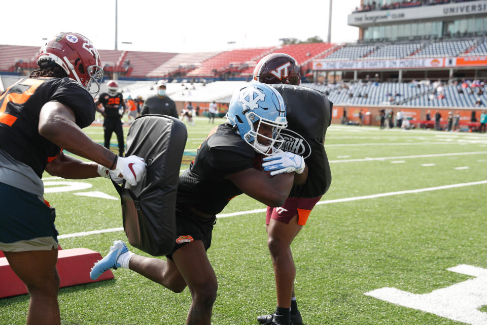 North Carolina RB Michael Carter (middle) practices for the National Team at the 2021 Reeses Senior Bowl. (Photo by Senior Bowl/Collegiate Images/Getty Images)