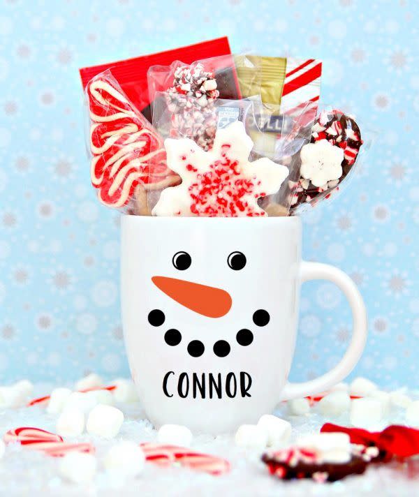 <p>Another quick and simple last-minute gift to make, this snowman has the added bonus of being personalized.</p><p><strong>Get the tutorial at <a href="https://www.happygoluckyblog.com/diy-personalized-snowman-mug/" rel="nofollow noopener" target="_blank" data-ylk="slk:Happy Go Lucky;elm:context_link;itc:0;sec:content-canvas" class="link ">Happy Go Lucky</a>.</strong></p><p><a class="link " href="https://www.amazon.com/Cricut-Explore-Air-Matte-Black/dp/B078WFWM1F/ref=sr_1_1?tag=syn-yahoo-20&ascsubtag=%5Bartid%7C10050.g.22825300%5Bsrc%7Cyahoo-us" rel="nofollow noopener" target="_blank" data-ylk="slk:SHOP CRICUTS;elm:context_link;itc:0;sec:content-canvas">SHOP CRICUTS</a> </p>