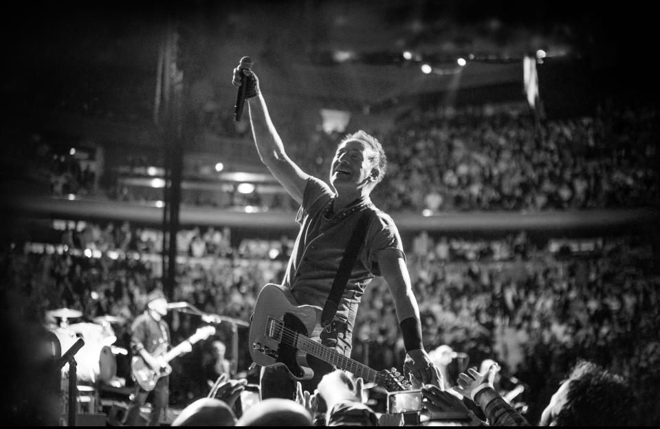 Bruce Springsteen and the E Street Band open their new tour in Tampa, Fla., on Wednesday, Feb. 1. Above, Danny Clinch captures The Boss performing.