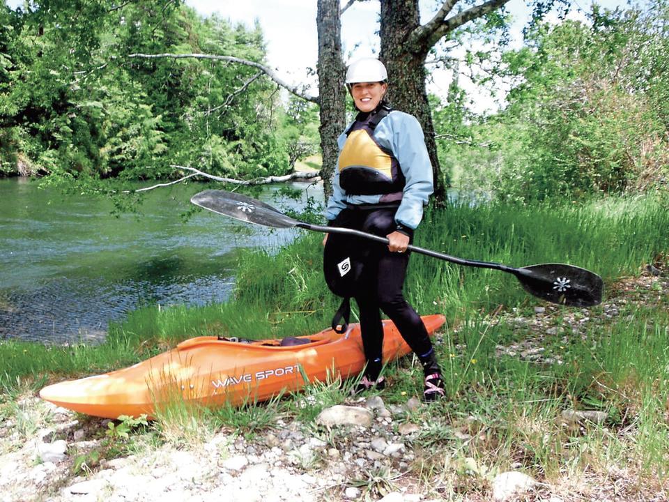 Mary Neal with Kayak