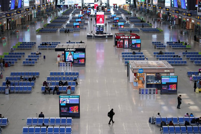 Travellers are seen at the Shanghai Hongqiao Railway Station on the last day of the Spring Festival travel rush, as the country is hit by an outbreak of the novel coronavirus, in Shanghai