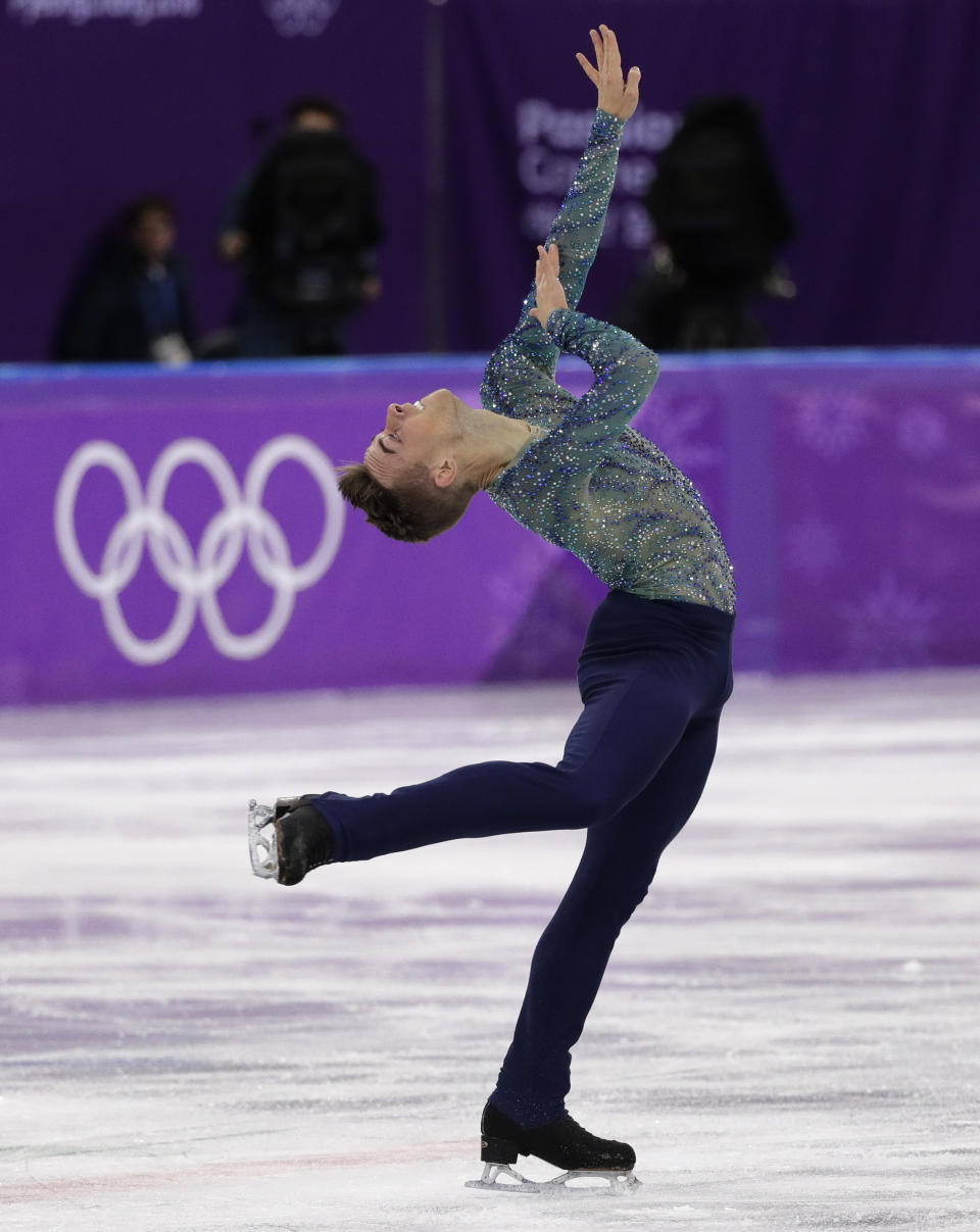 FILE - Adam Rippon of the United States performs during the men's free figure skating final in the Gangneung Ice Arena at the 2018 Winter Olympics in Gangneung, South Korea, Saturday, Feb. 17, 2018. Soon after those Olympics, Rippon won “Dancing With The Stars." His involvement in the entertainment world continued and has expanded, while his increasing fame has provided Rippon a platform to speak out in support of LGBTQ rights and the freedom to be oneself. (AP Photo/David J. Phillip, File)