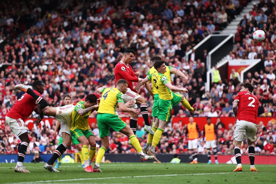 MANCHESTER, ENGLAND - APRIL 16: Cristiano Ronaldo of Manchester United heads the ball wide during the Premier League match between Manchester United and Norwich City at Old Trafford on April 16, 2022 in Manchester, England. (Photo by Naomi Baker/Getty Images)