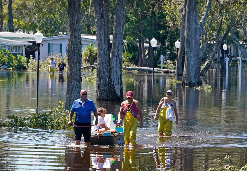 Residents and their pets had to be rescued from the Colony In the Wood mobile home park in Port Orange due to flooding from Tropical Storm Ian.