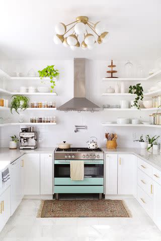 <p><a href="https://abeautifulmess.com/elsies-kitchen-tour-before-after/" data-component="link" data-source="inlineLink" data-type="externalLink" data-ordinal="1">A Beautiful Mess</a></p>