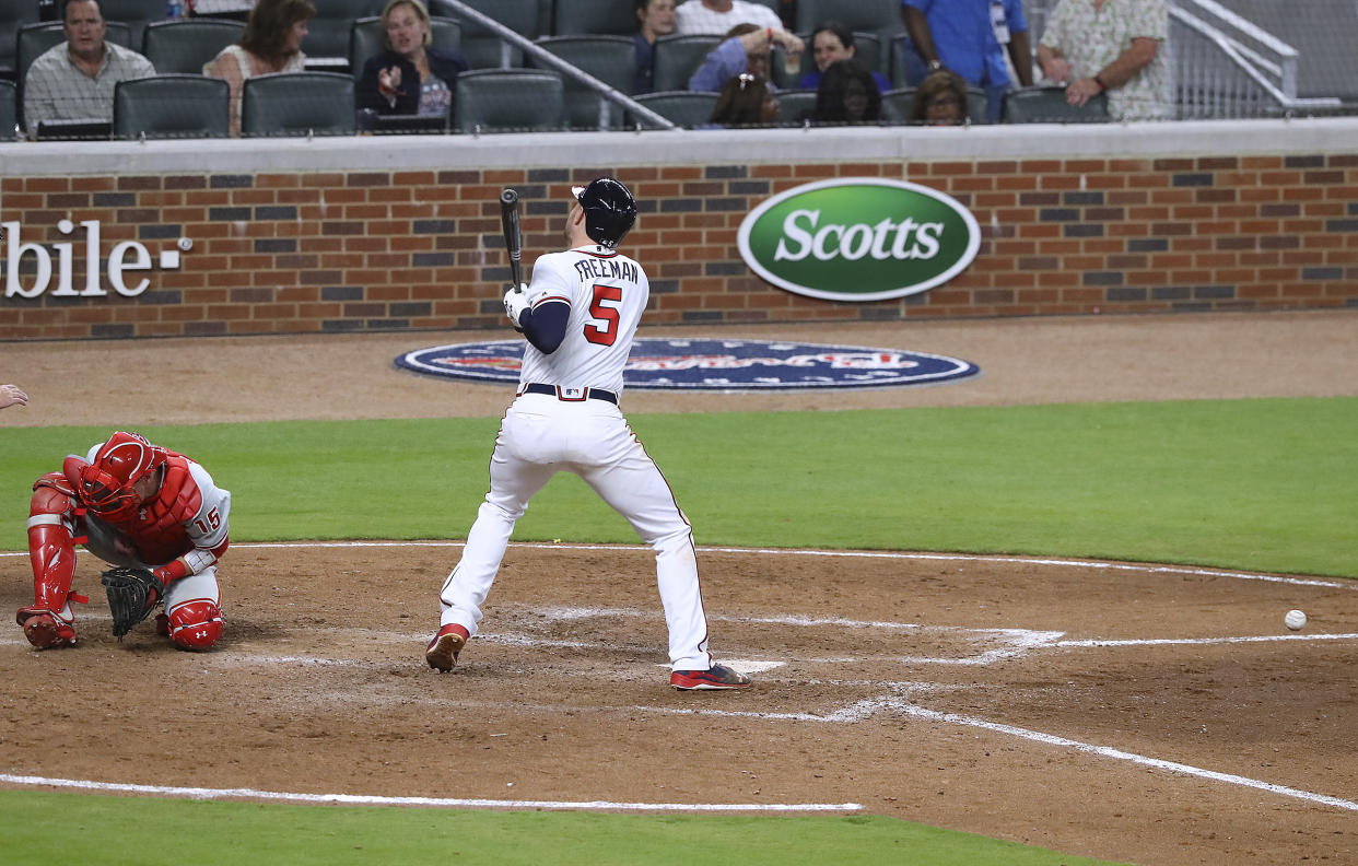 Freddie Freeman took a fastball to the same wrist he broke in 2017 on Wednesday and immediately walked to the dugout and left the game. (AP)