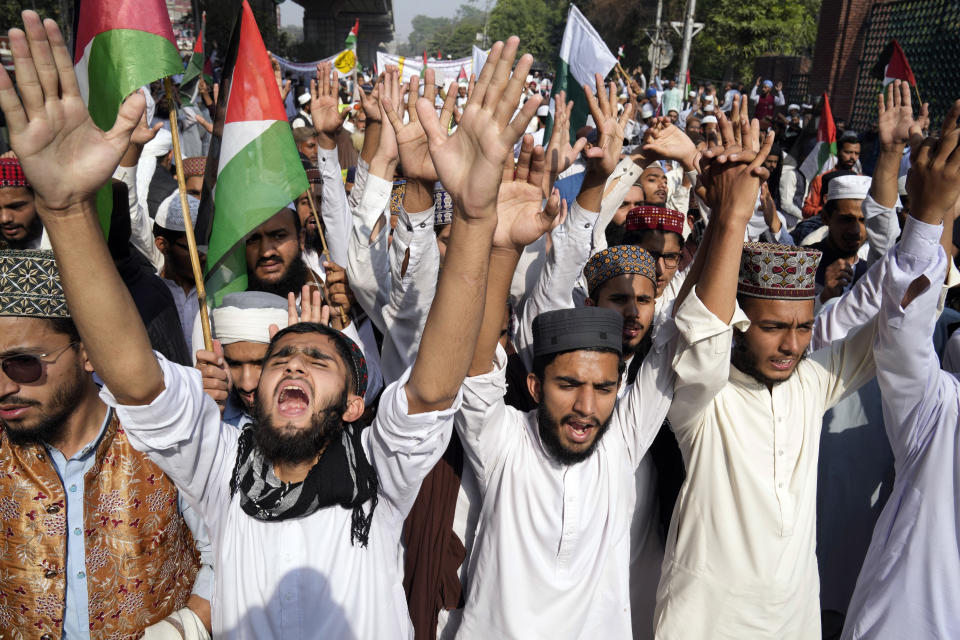 FILE - Pakistan's seminary students and teachers chant slogans during a demonstration against the Israeli response in Gaza to Hamas' attack, to show solidarity with Palestinian people, in Lahore, Pakistan on Nov. 15, 2023. (AP Photo/K.M. Chaudary, File)