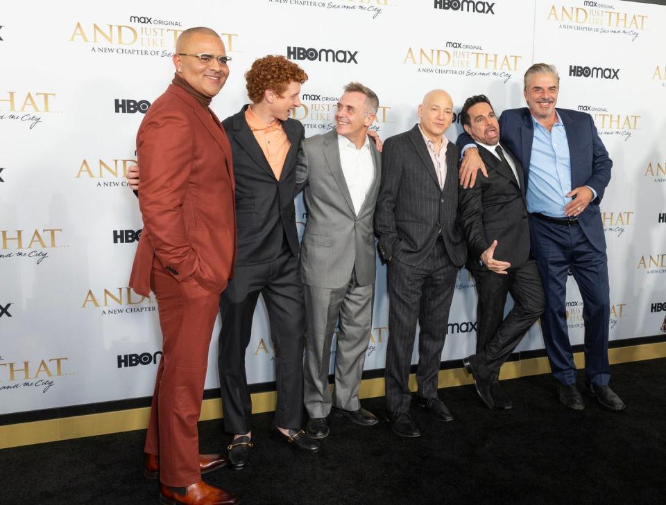 <span class="caption">The male cast of 'And Just Like That' — Chris Noth on the far right — pose before the show's premiere in December 2021 in New York.</span> <span class="attribution"><span class="source">(Shutterstock)</span></span>