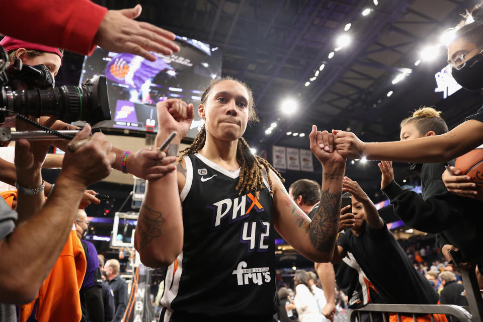 PHOENIX, ARIZONA - OCTOBER 13: Brittney Griner #42 of the Phoenix Mercury celebrates with fans following Game Two of the 2021 WNBA Finals at Footprint Center on October 13, 2021 in Phoenix, Arizona.  The Mercury defeated the Sky 91-86 in overtime. NOTE TO USER: User expressly acknowledges and agrees that, by downloading and or using this photograph, User is consenting to the terms and conditions of the Getty Images License Agreement.  (Photo by Christian Petersen/Getty Images)