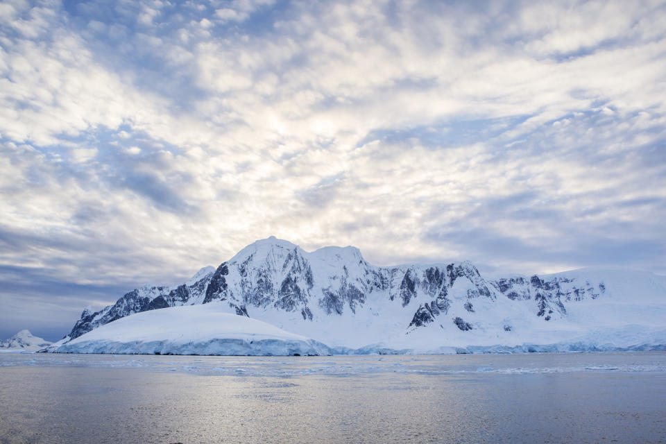 Antarctic, Antarctic Peninsula, snow covered mountains with ice and glacier in the morning