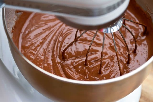 <p>Stephanie Frey / Getty Images</p> Chocolate cake batter from a boxed mix