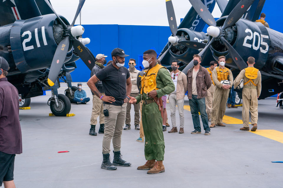 Director J.D. Dillard with Jonathan Majors on the set of Columbia Pictures’ DEVOTION.