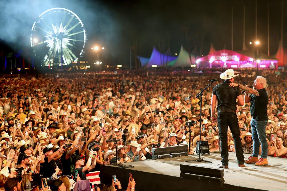 Jon Pardi and Guy Fieri appear onstage during Day 1 of the 2023 Stagecoach Festival.