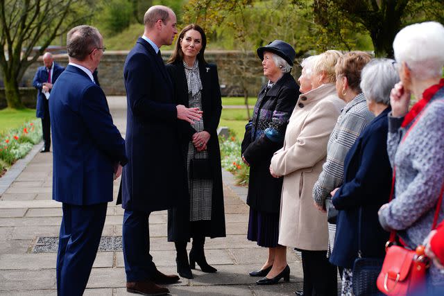 Ben Birchall - WPA Pool / Getty Images Prince William and Kate talking to Gloria Davies and Denise Morgan