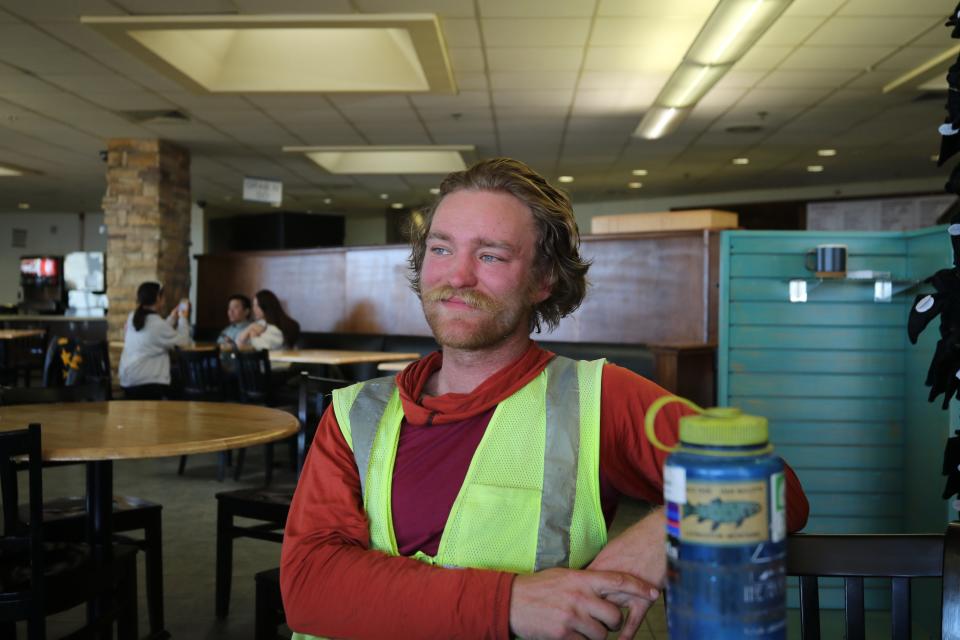 Spencer McCullough visits Carlsbad Caverns during his 18,000-mile bike trip to every national park in the U.S., March 9, 2024 at the Carlsbad Caverns National Park Visitors Center.