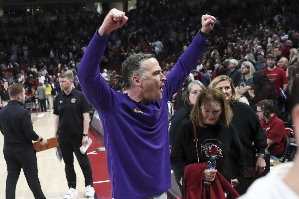 LSU head coach Matt McMahon celebrates after his team upset South Carolina in an NCAA college basketball game Saturday, Feb. 17, 2024, in Columbia, S.C. LSU won 64-63. (AP Photo/Artie Walker Jr.)