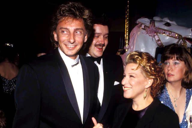 <p>Ralph Dominguez/MediaPunch</p> Barry Manilow and Bette Midler in 1990