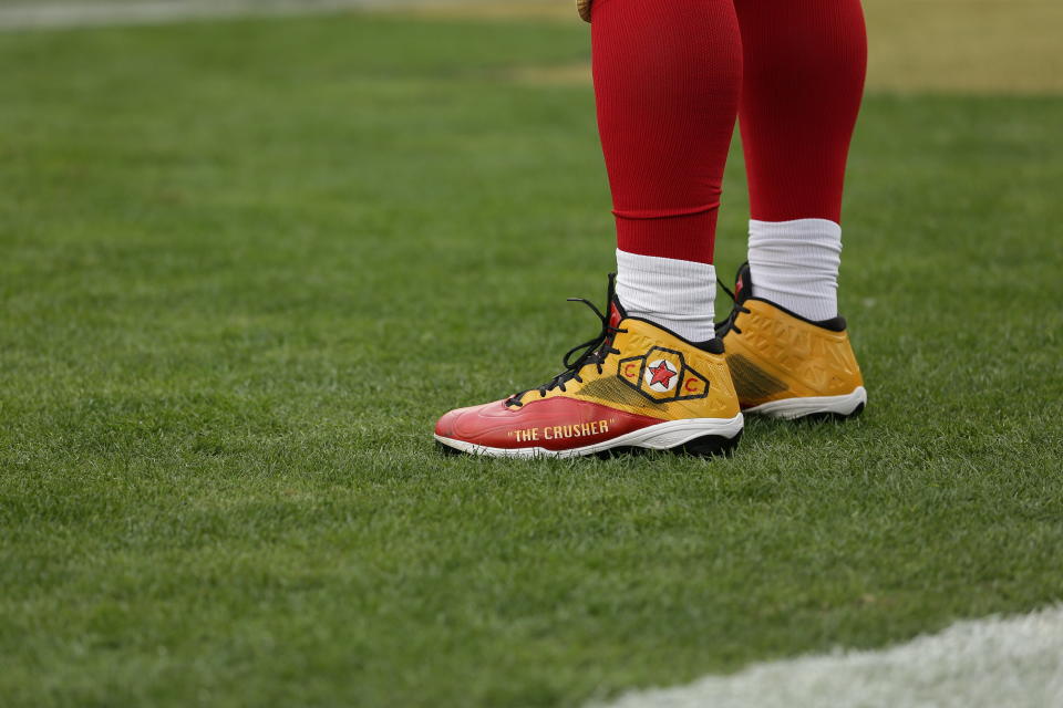 Earl Mitchell wearing his "Connor's Cure" cleats during a week 15 game against the Seattle Seahawks - San Francisco 49ers