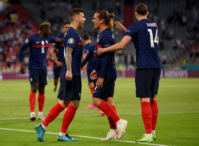 Griezmann, second right, celebrates France's goal against Germany with his team-mates