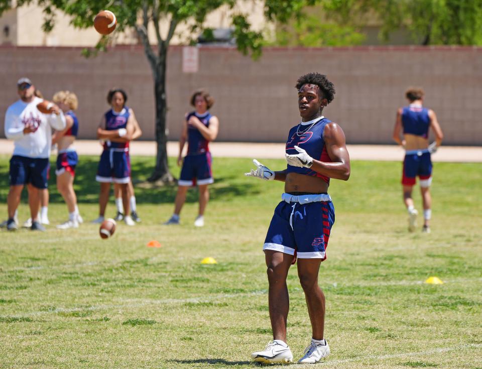 May 18, 2022; Gilbert, Arizona; USA; Perry's CJ Snowden runs drills during the Chandler district Jamboree at Perry High School.