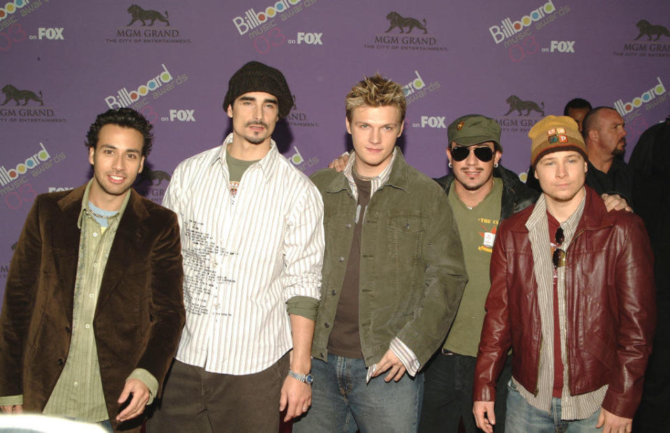 The Backstreet Boys all look like they went shopping at the same store together