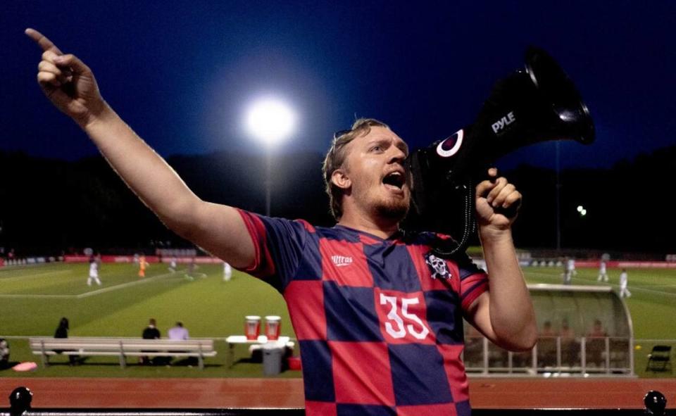 Austin Adams, 26, of Soulard, leads the St. Louis City 2 fan section in chants on Aug. 6 during a matchup against Chicago Fire 2 at Ralph Korte Stadium in Edwardsville.