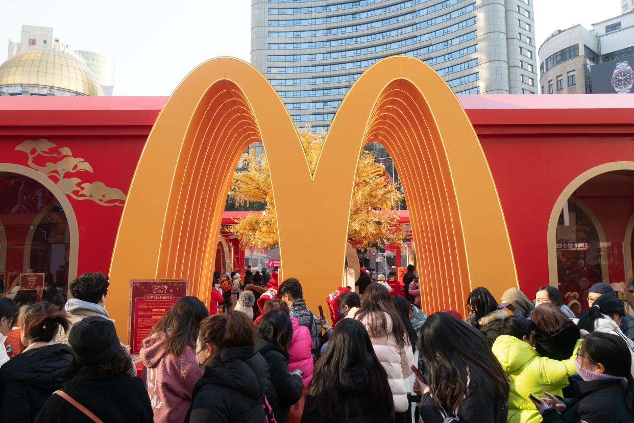 Visitors in Shanghai throng a McDonald's during one of its promotions.