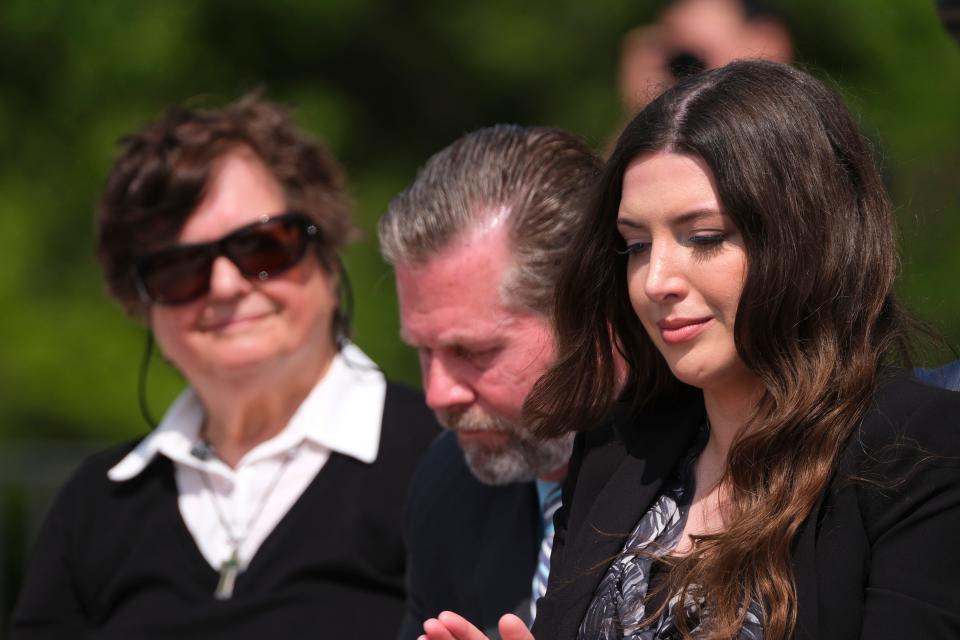 Sister Helen Prejean, left, Rep. Kevin McDugle and Lea Glossip listen to Phil McGraw on Tuesday during a Justice Rally for Richard Glossip at the state Capitol.