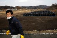 The Wider Image: The man who saves forgotten cats in Fukushima's nuclear zone