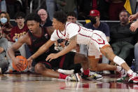 Stanford forward Harrison Ingram, left, and Southern California guard Boogie Ellis go after a loose ball during the first half of an NCAA college basketball game Thursday, Jan. 27, 2022, in Los Angeles. (AP Photo/Mark J. Terrill)