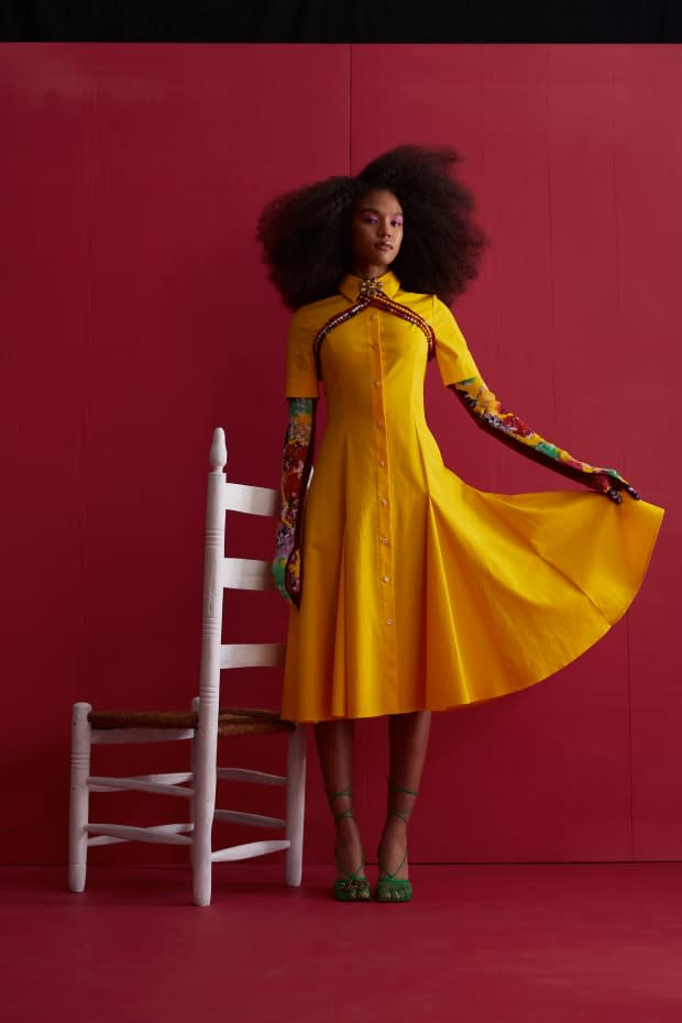 This yellow shirtdress was made using deadstock fabric from Carolina Herrera.