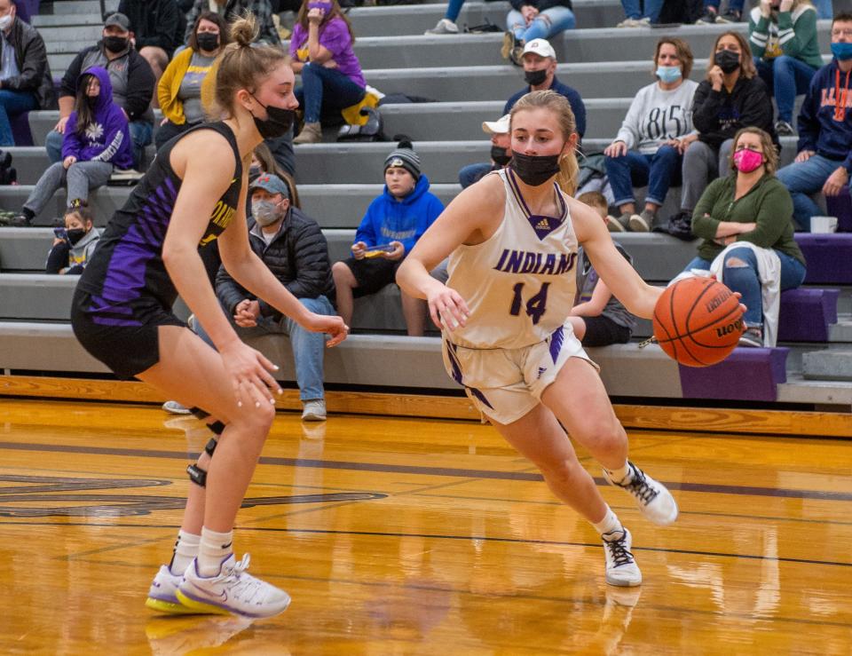 Pecatonica's Paige Moore drives past Orangeville's Whitney Sullivan during the second quarter of their game on Saturday, Jan. 22, 2022, in Pecatonica.
