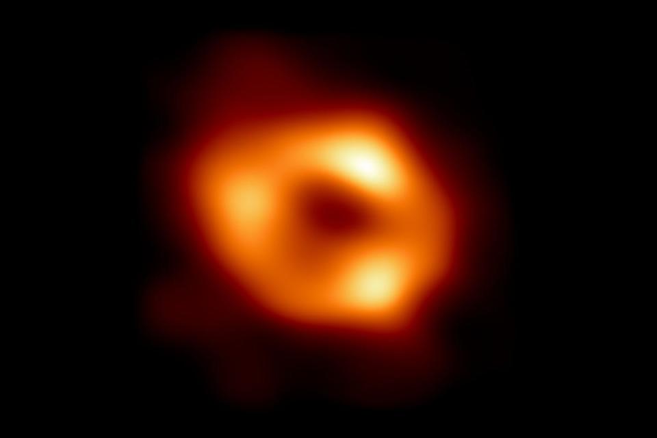 This colorized image of a massive black hole at the center of the Milky Way galaxy was unveiled Thursday, May 12, 2022 by the Event Horizon Telescope collaboration.