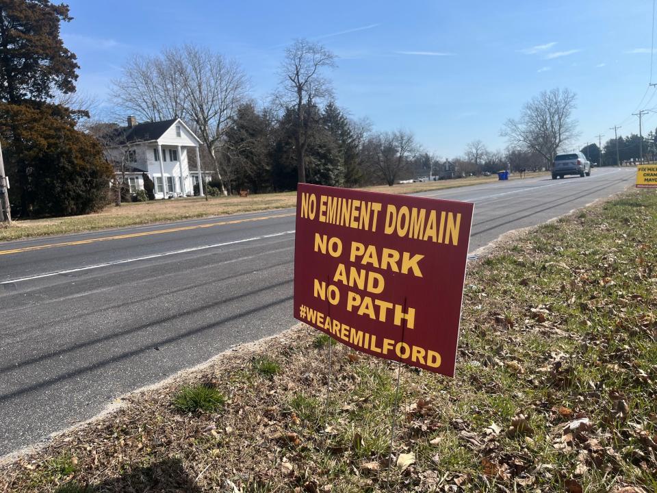 Just outside Milford, a sign decries eminent domain proceedings against a chicken farmer named Annette Billings on Feb. 22, 2024. The eminent domain proceedings were abandoned by the city of Milford.