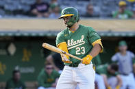 Oakland Athletics' Shea Langeliers reacts after striking out with the bases loaded to end the sixth inning in the second baseball game of the team's doubleheader against the Texas Rangers, Wednesday, May 8, 2024, in Oakland, Calif. (AP Photo/Godofredo A. Vásquez)