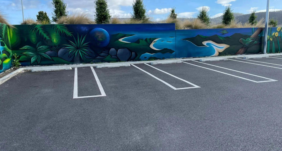 Empty shopping centre car park in Tasmania with double lines. 