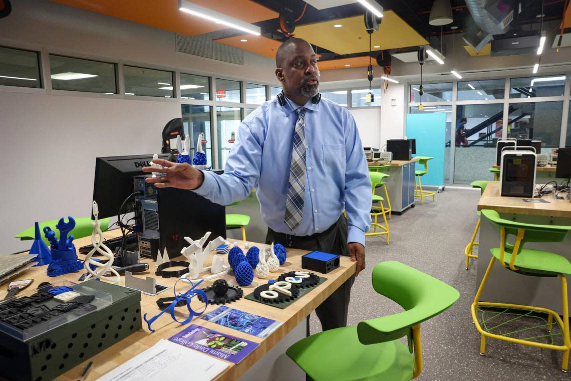 Anselm Knights, chairperson of the School of Engineering and Technology, talks about 3D printed objects, in a lab inside the artificial intelligence center at Miami Dade College North Campus on March 6, 2023.